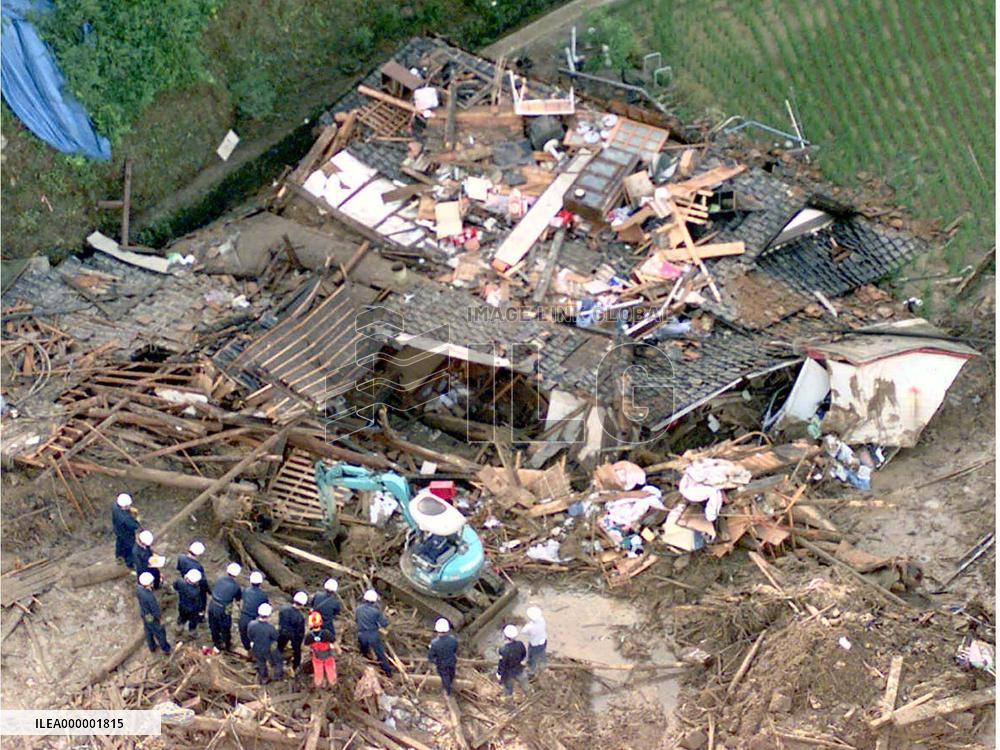 Rescuers search for people missing in torrential rain