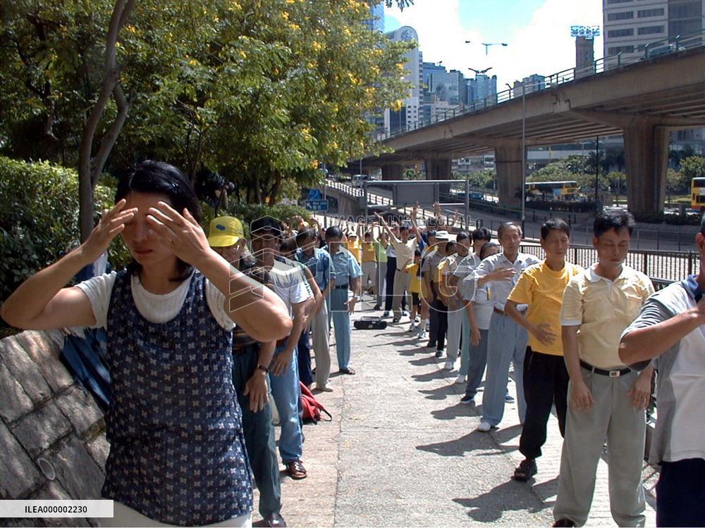 Falun Gong followers urge Beijing to stop persecuting