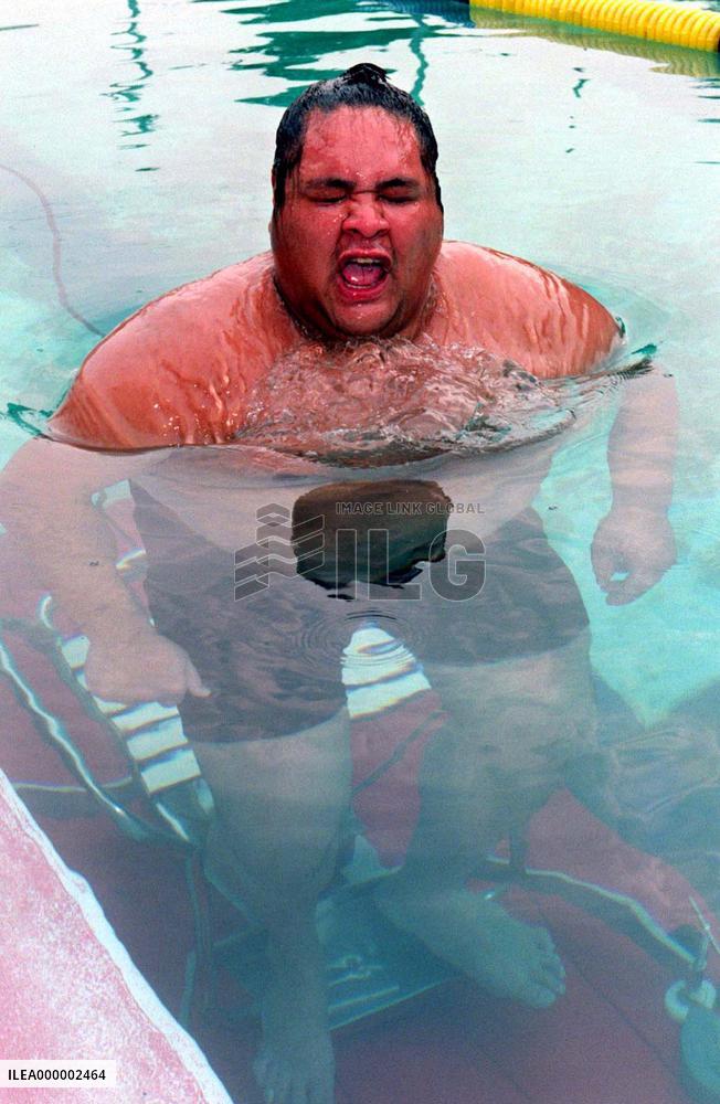 Yokozuna Akebono undergoes fatness test