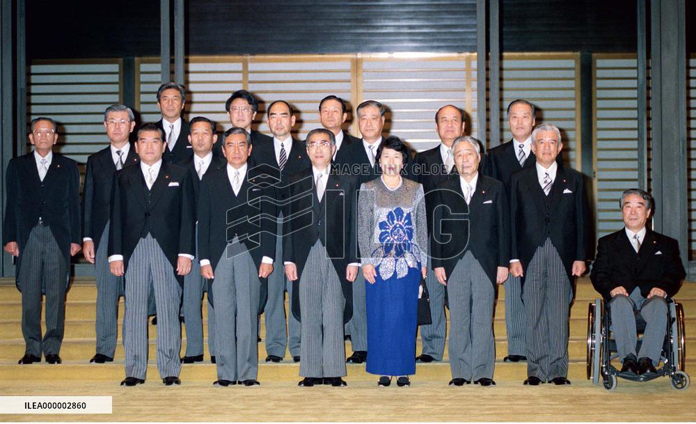 Obuchi launches new coalition cabinet