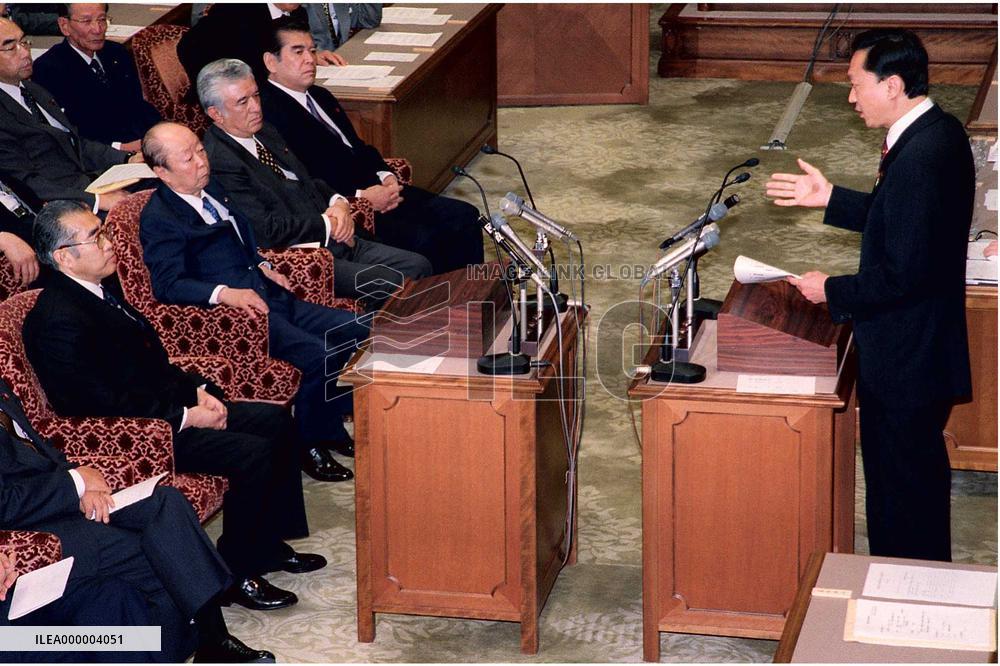 Obuchi, opposition leaders spar over scandal, finance