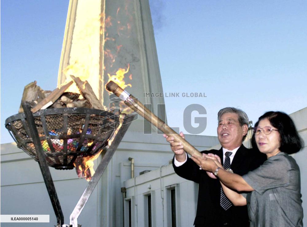 People commemorate eve of anniversary of end of Okinawa battle