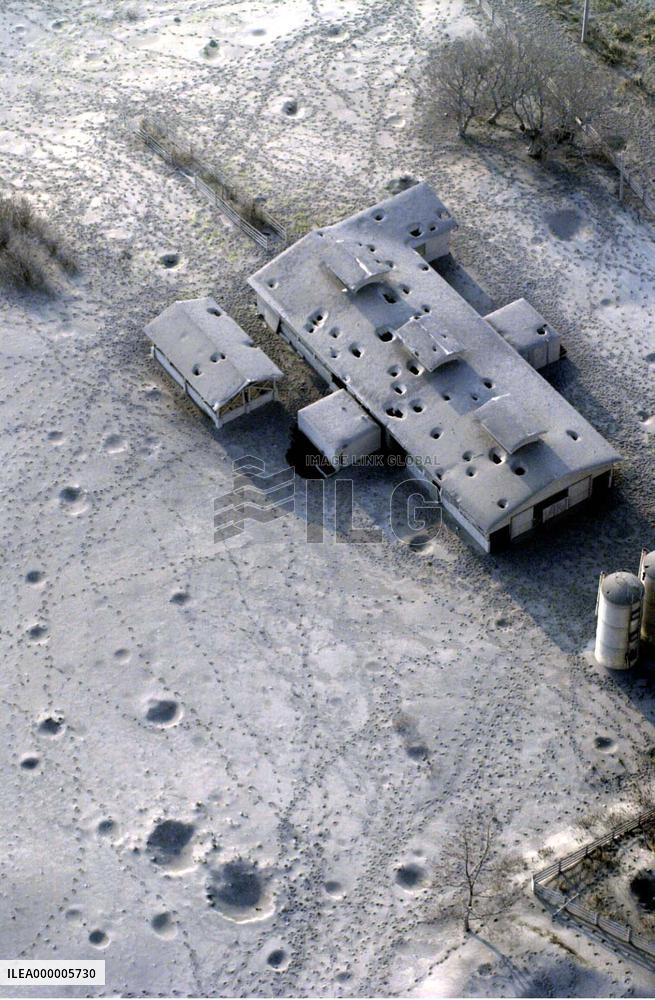 Village-run ranch on Miyakejima carpeted with volcanic ash
