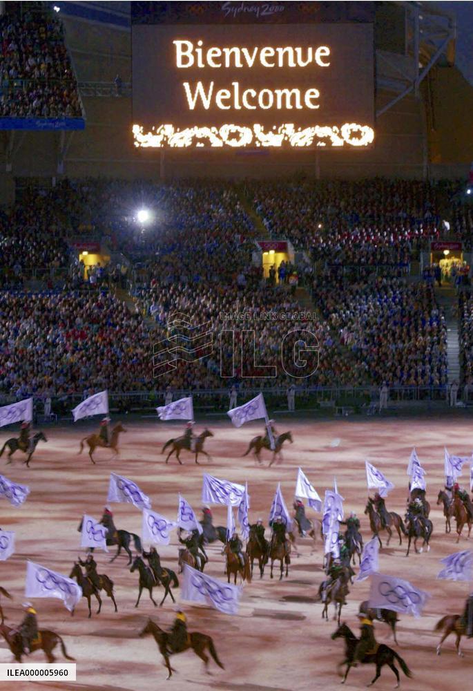 Stockmen on horse form Olympic rings