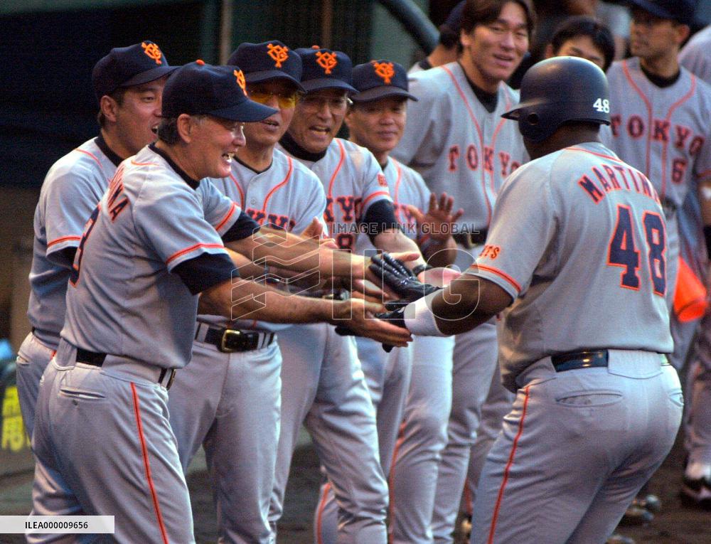 Martinez slams three-run homer