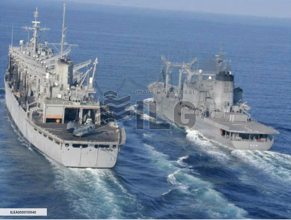 Japanese supply ship refuels U.S. naval vessel