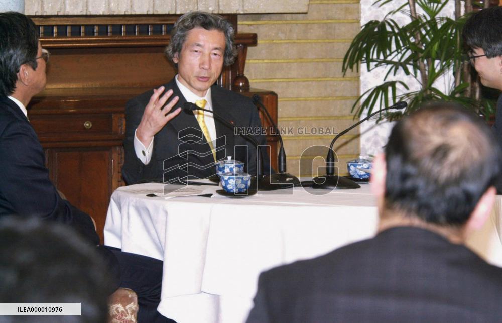 Koizumi denies plan for cabinet reshuffle