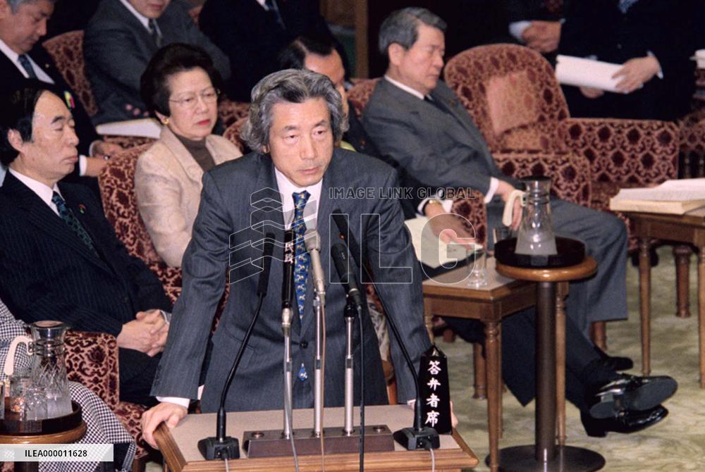 Koizumi says took 'responsibility' with sackings