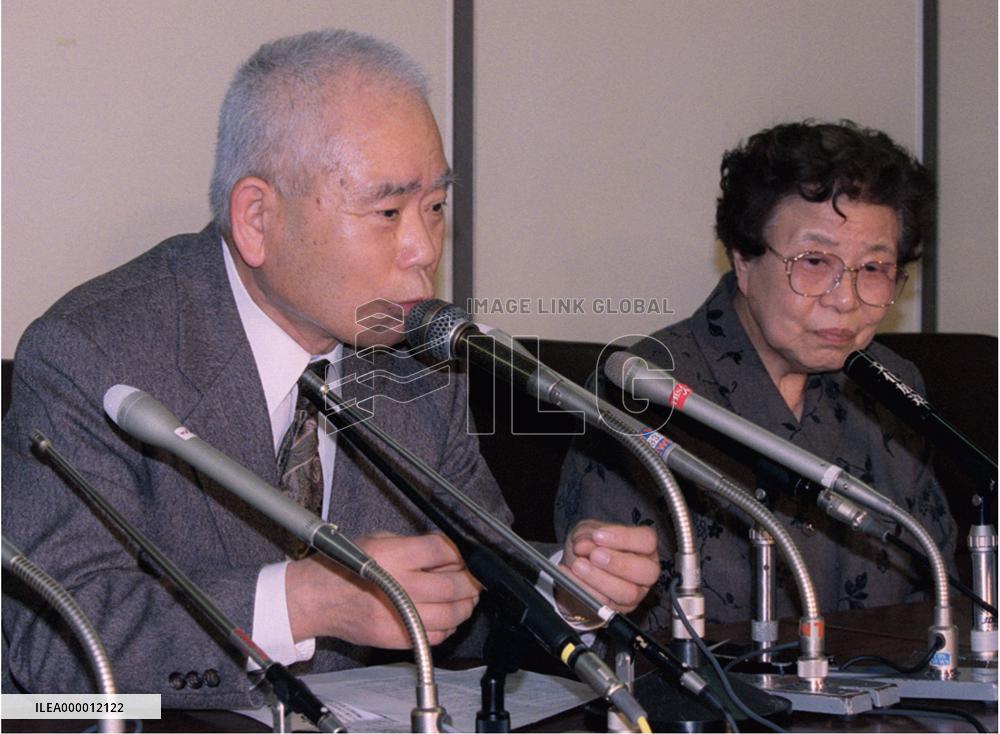 Keiko's parents talk with the media