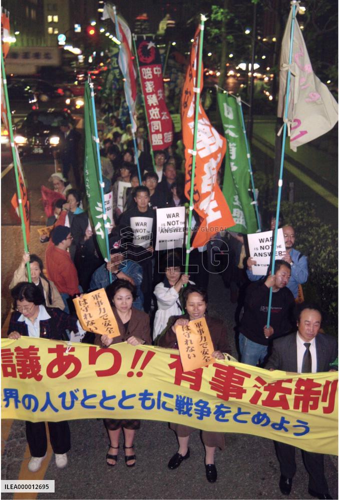 Opponents parade to protest against emergency bills
