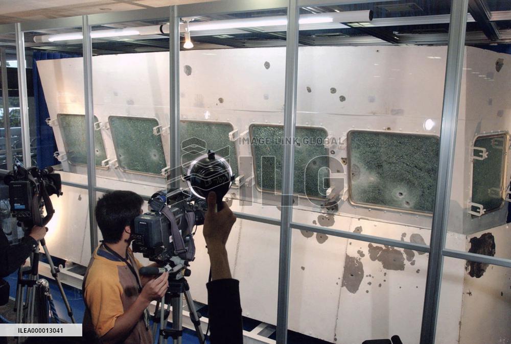 Coast guard shows off boat part damaged in Dec. gunbattle