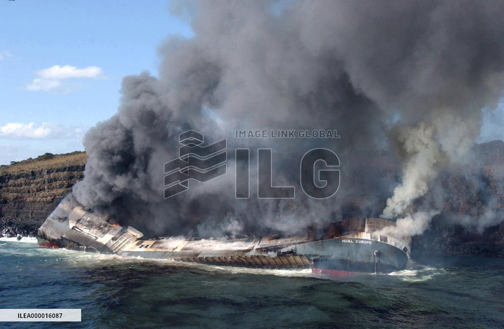 Freighter stranded on Izu-Oshima Island catches fire