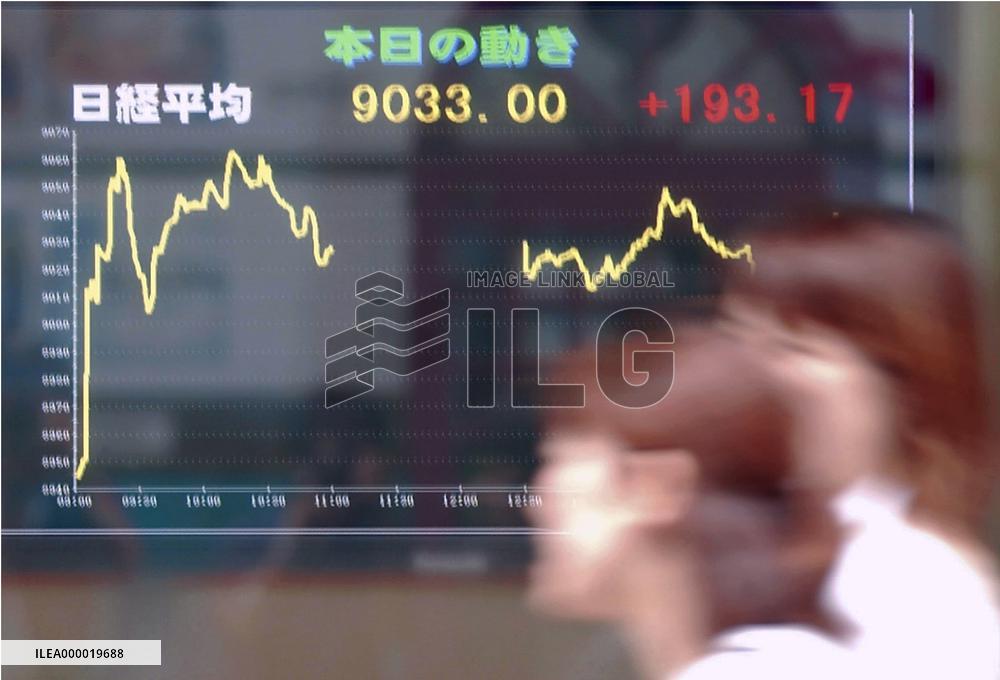 Tokyo's Nikkei closes above 9,000