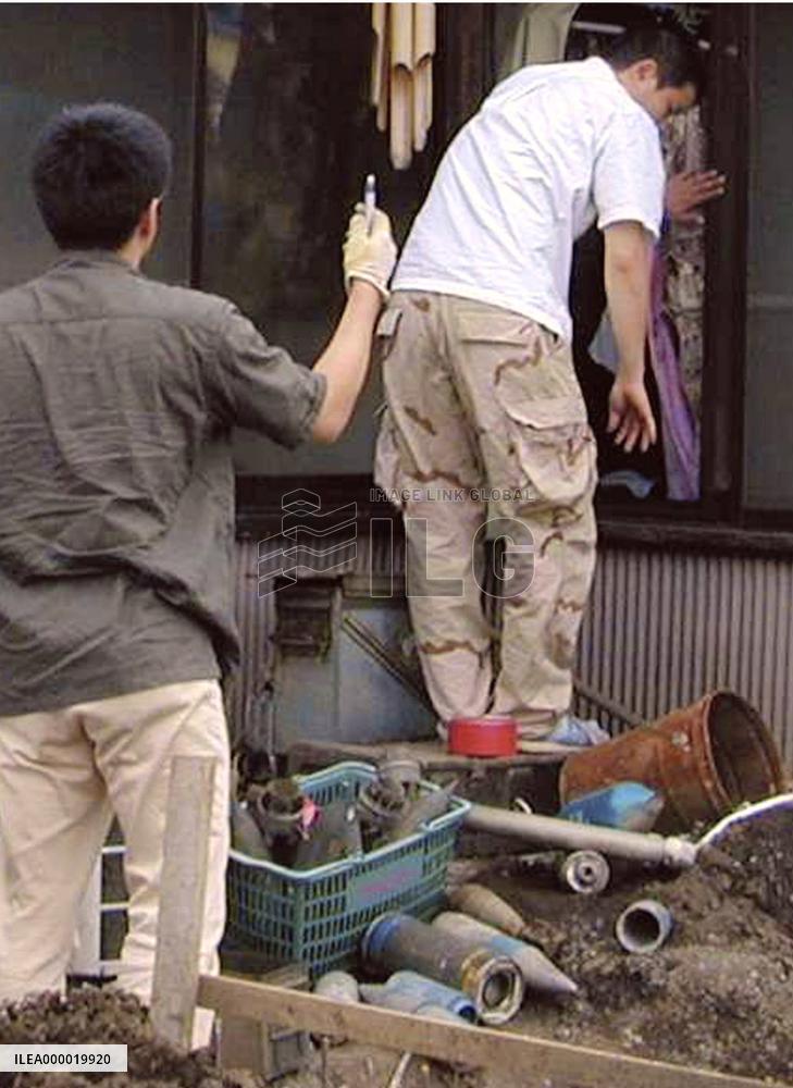 (2)Man arrested over explosion at parcel delivery firm