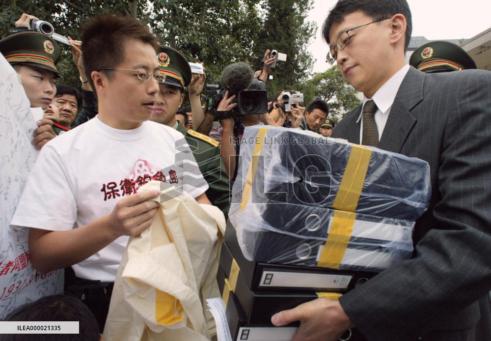 WWII reparation activists give signatures to Japan embassy