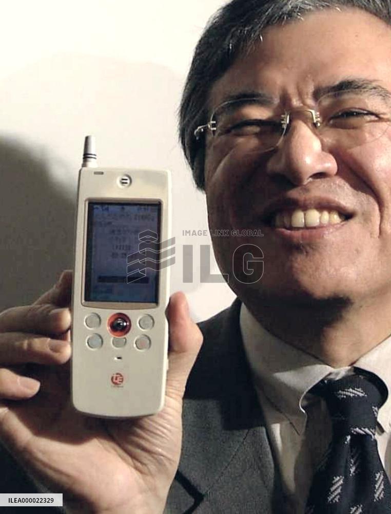 Developer of TRON devises PHS to read bar codes