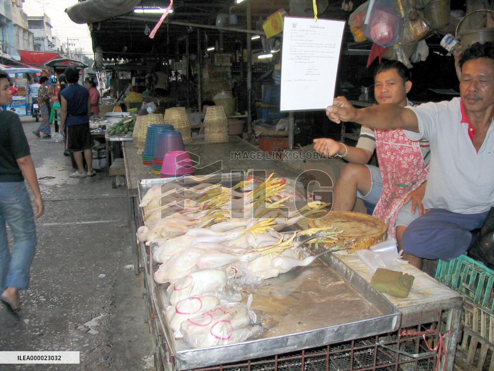 Consumers shun buying chickens in Bangkok market