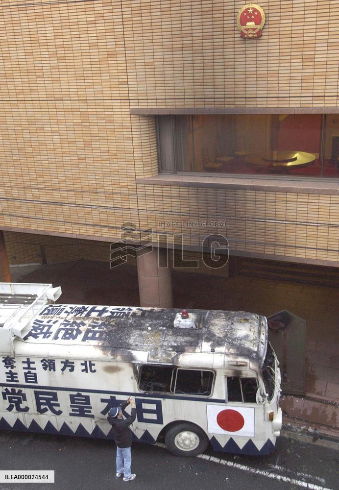 China lodges complaint as rightists' crash into consulate