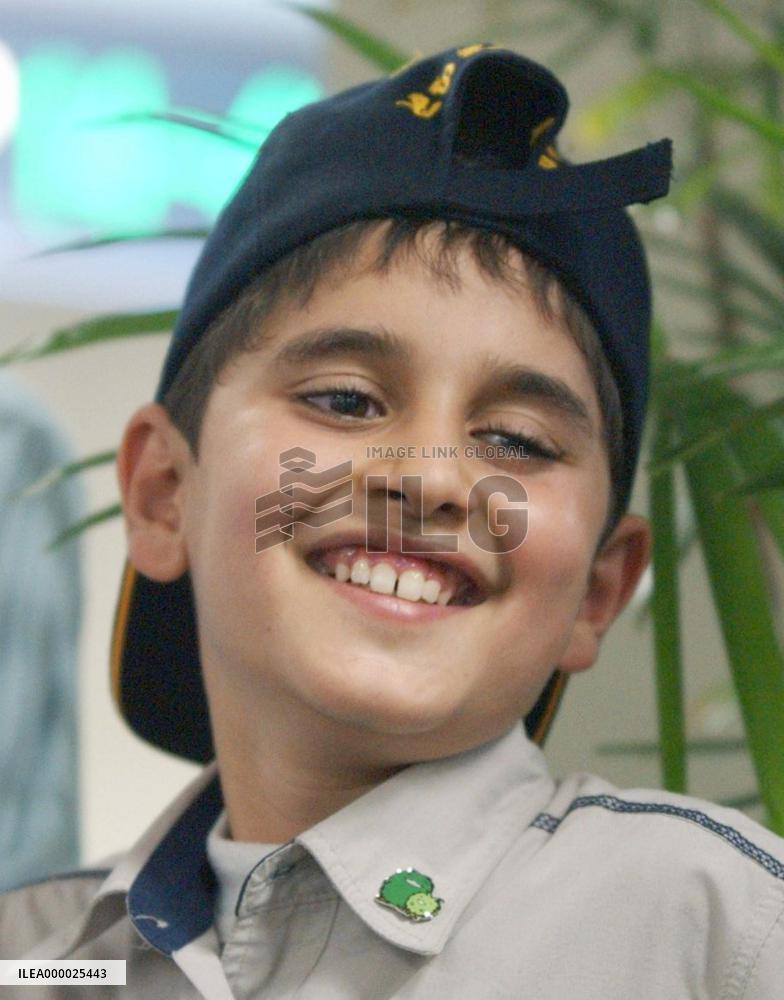 (1)Iraqi boy leaves for home after eye surgery