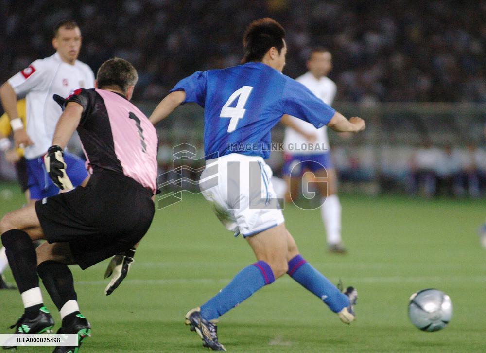 (1)Japan edges Serbia-Montenegro