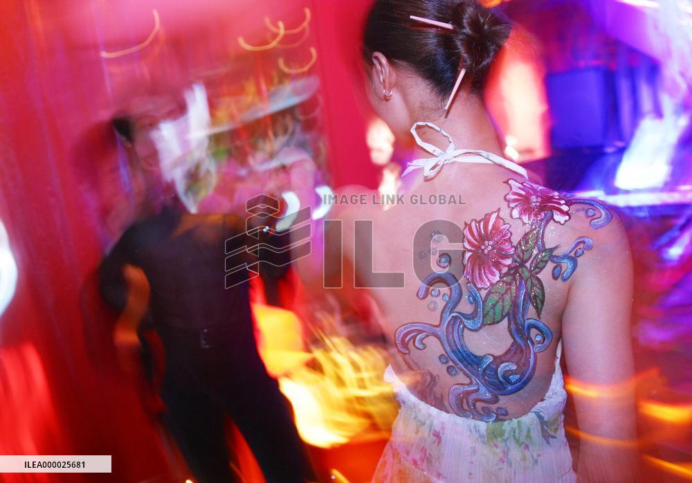 Chinese Youth Looks for Fun in the Bar