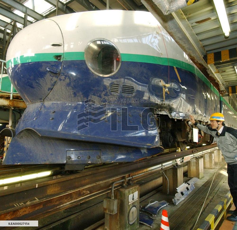 Bullet train derailed in Niigata quake shown to press