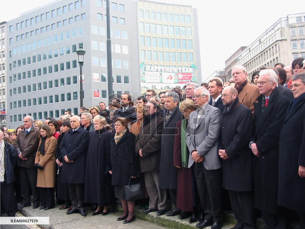 EU officials observe a moment of silence