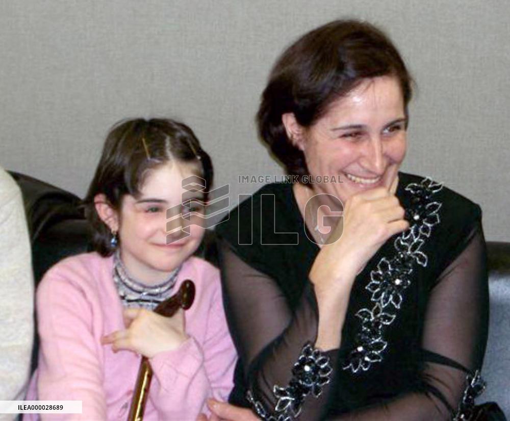 Girl, mother in Russian school siege arrive in Japan for treatme