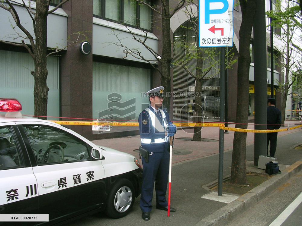 Man arrested for hurling firebomb at Bank of China branch in Yok