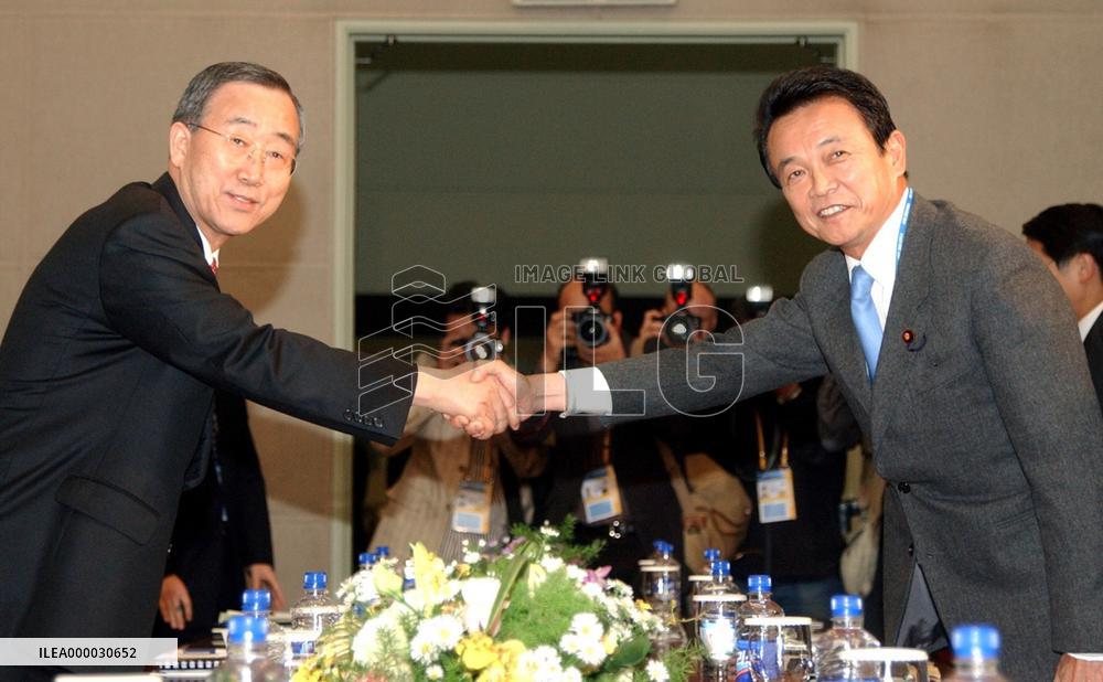 Ban expresses regret over historical issues to Japan's Aso