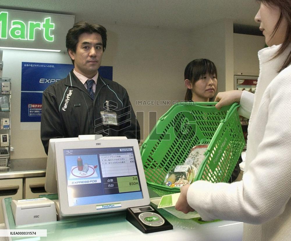 Supermarkets checking out department stores' IC tag success