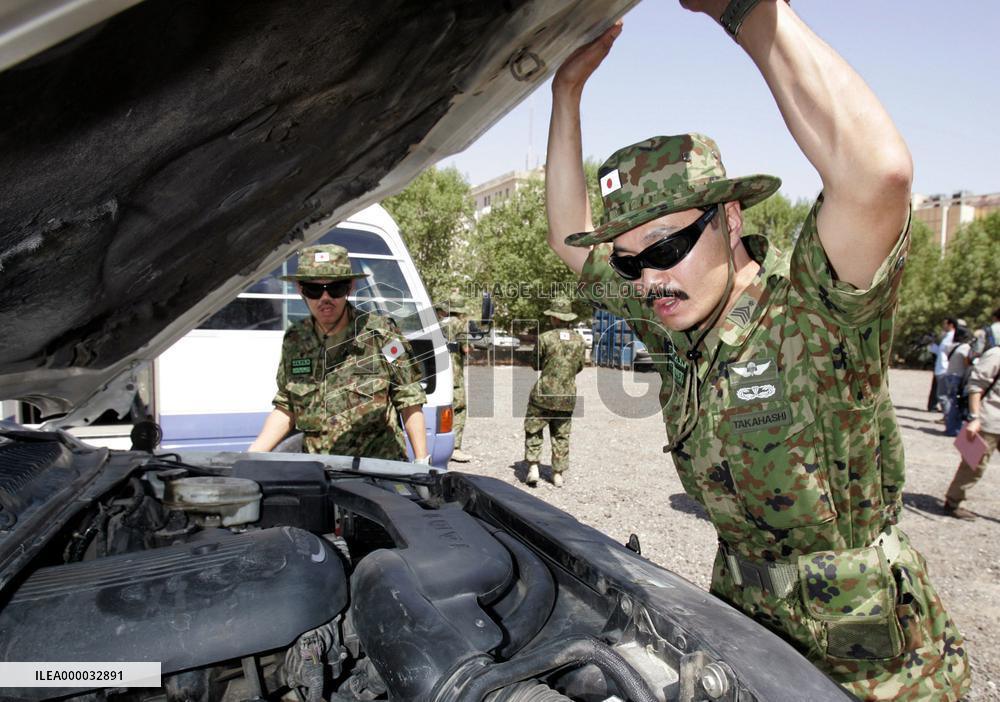 Japanese ground troops prepare for pullout