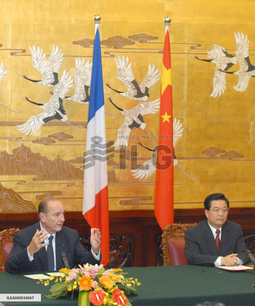 Chirac lauds China's support for U.N. resolution on N. Korea