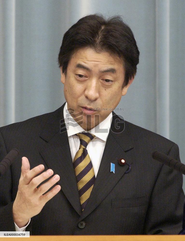 Tax-panel chief to resign over scandal, deals blow to Abe