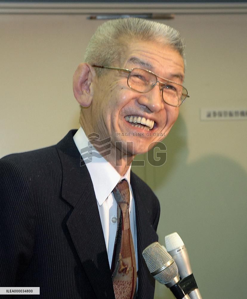 Abe taps think tank adviser Kosai as tax panel chief