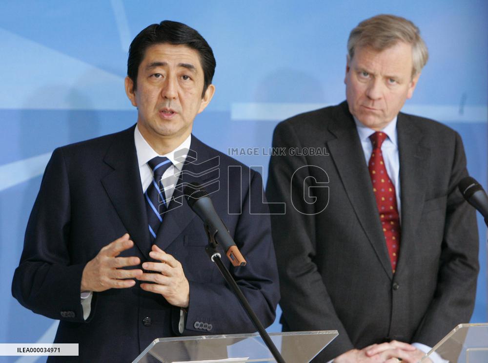 Abe tells NATO Japan won't shy from sending troops for int'l pea