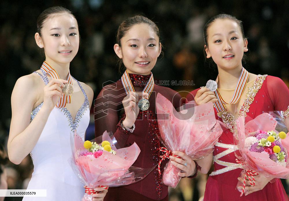 Ando wins title, Asada in 2nd at World Figure Skating