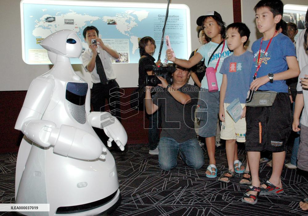 Toyota unveils tour-guide robot at exhibition hall
