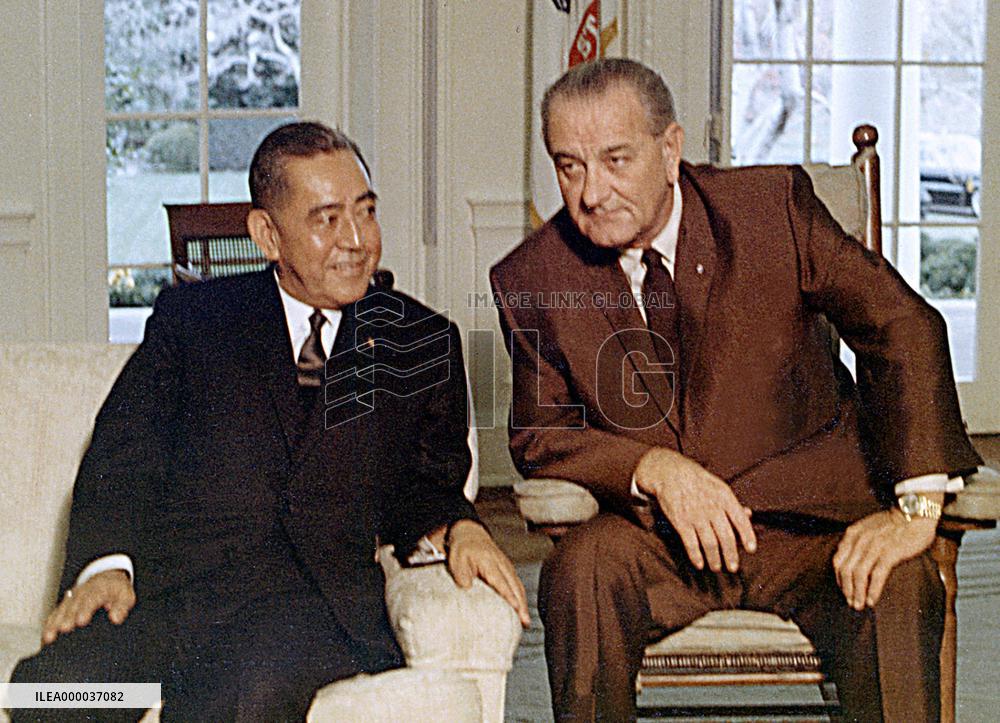 Johnson pressed Sato to pay money to fight communists in S.E. As