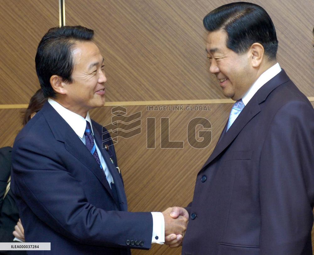 China's Jia Qinglin talks with LDP executives