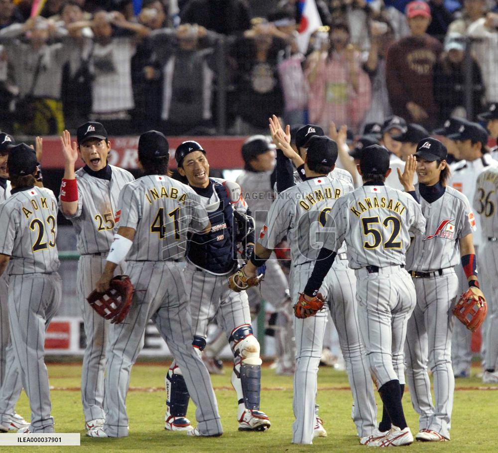 Japan edges S. Korea to move closer to Olympic berth