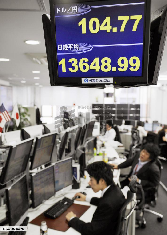 Dollar falls to 104 yen zone in early Tokyo deals