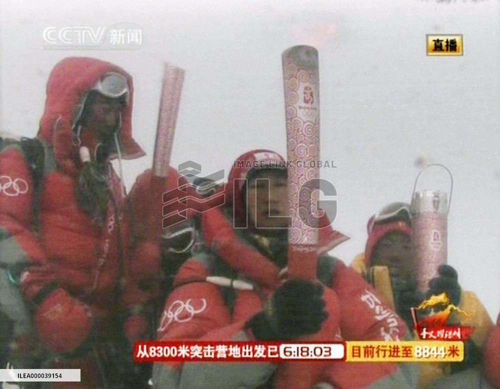 Olympic flame reaches peak of Mt. Everest