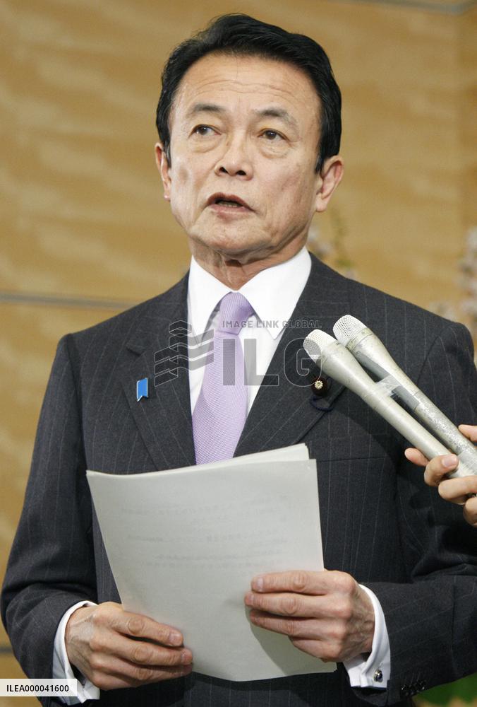 Aso orders ruling bloc to draw up additional economic steps