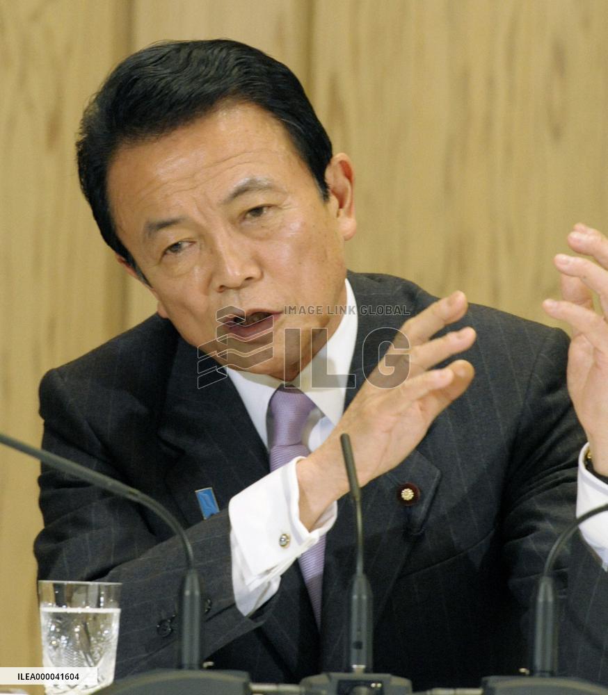 Aso says will not sit still if North Korea test-fires missile