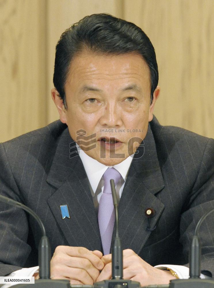 Aso says will not sit still if North Korea test-fires missile