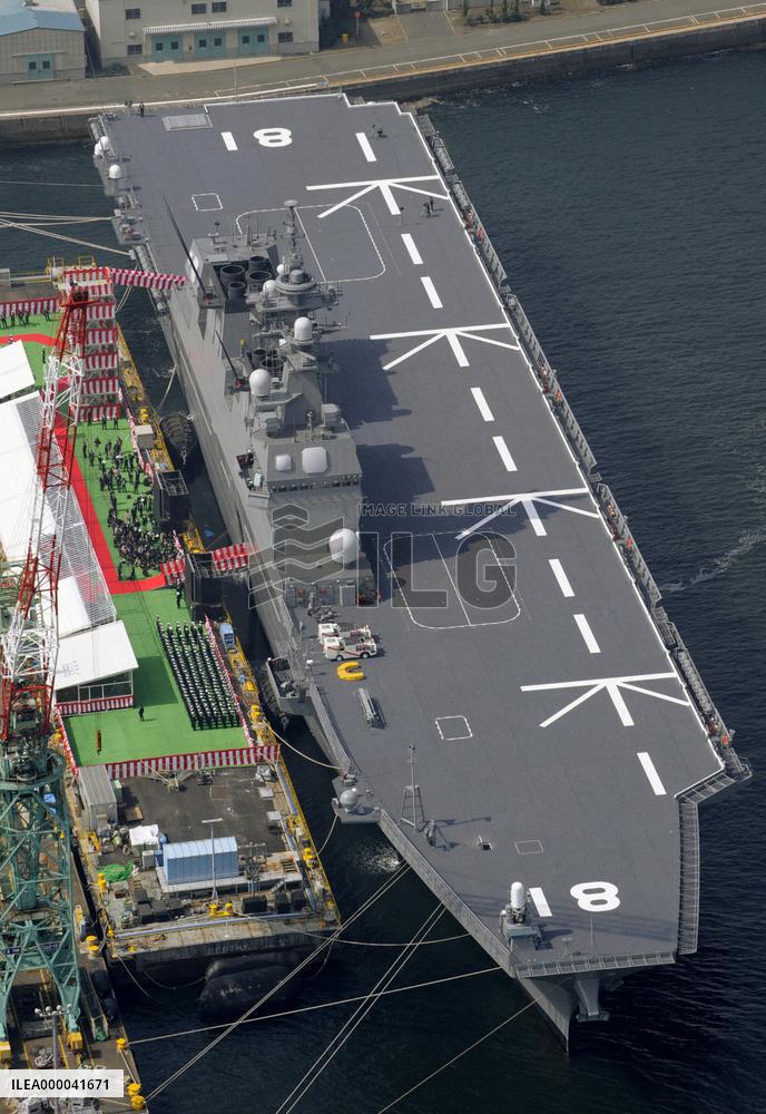 Japan's largest 'helicopter carrier' commissioned amid concerns