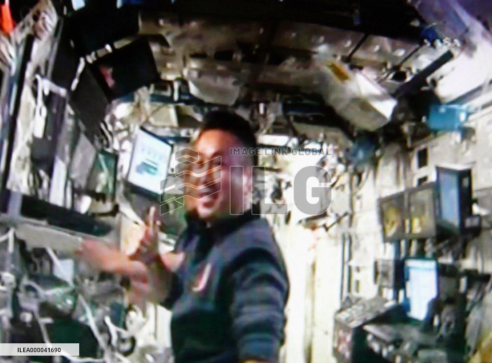 Astronauts install solar arrays on space station