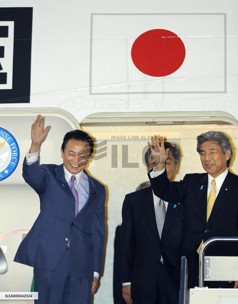 Aso heads to Thailand to discuss N. Korea, financial issues