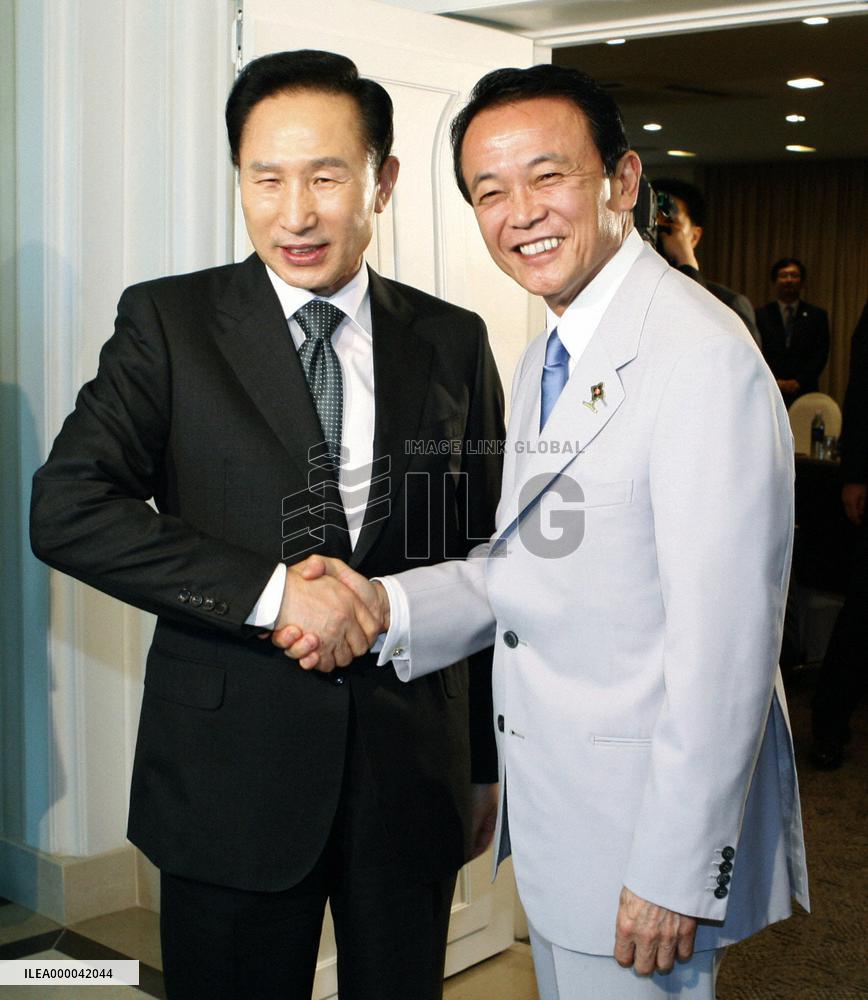 Aso hints Japan will accept UNSC statement on N. Korea's launch